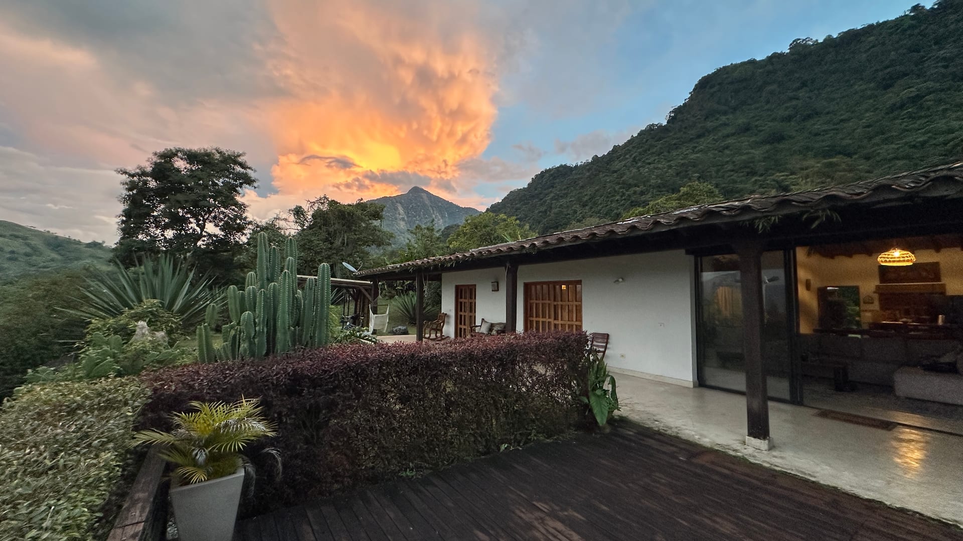 The house and covered terrace at sunset