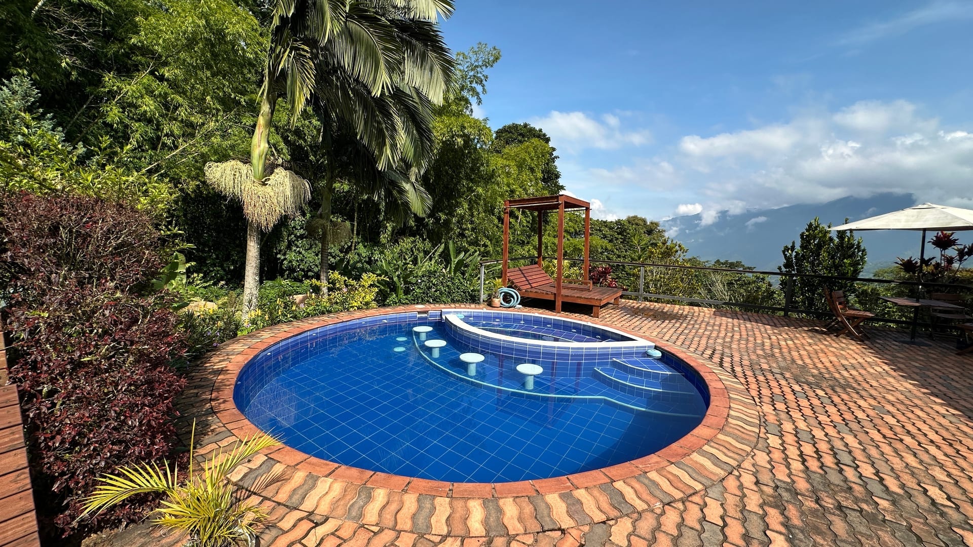 The swimming pool and mountain backdrop